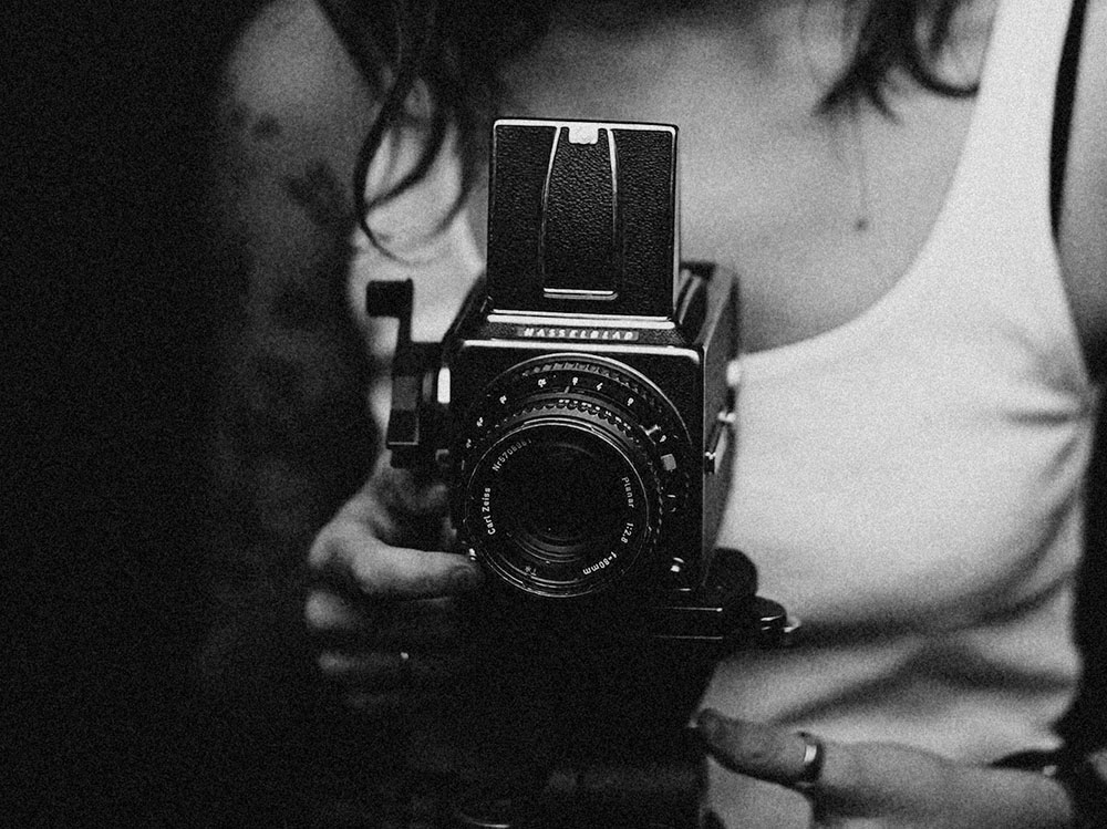 female photographer with camera