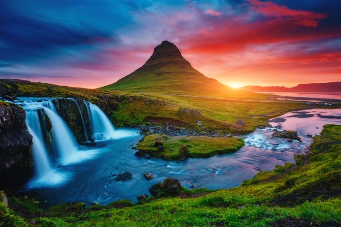 Kirkjufell volcano and waterfalls at sunset