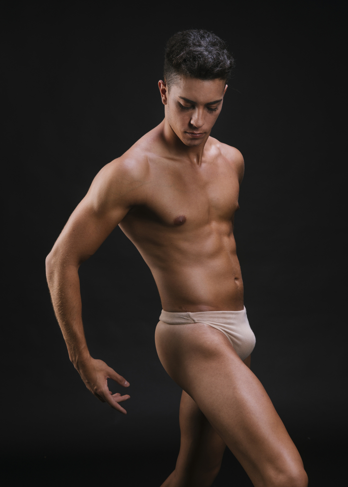 Nude Muscular male in dancing pose