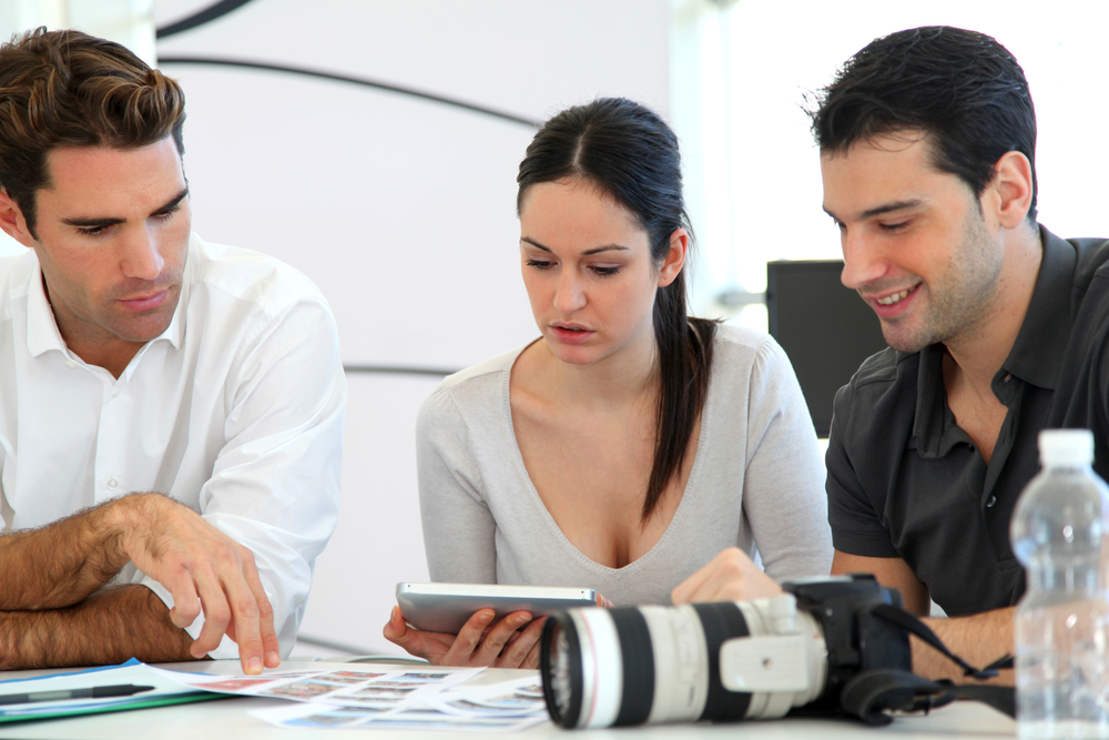 Photographer working with clients