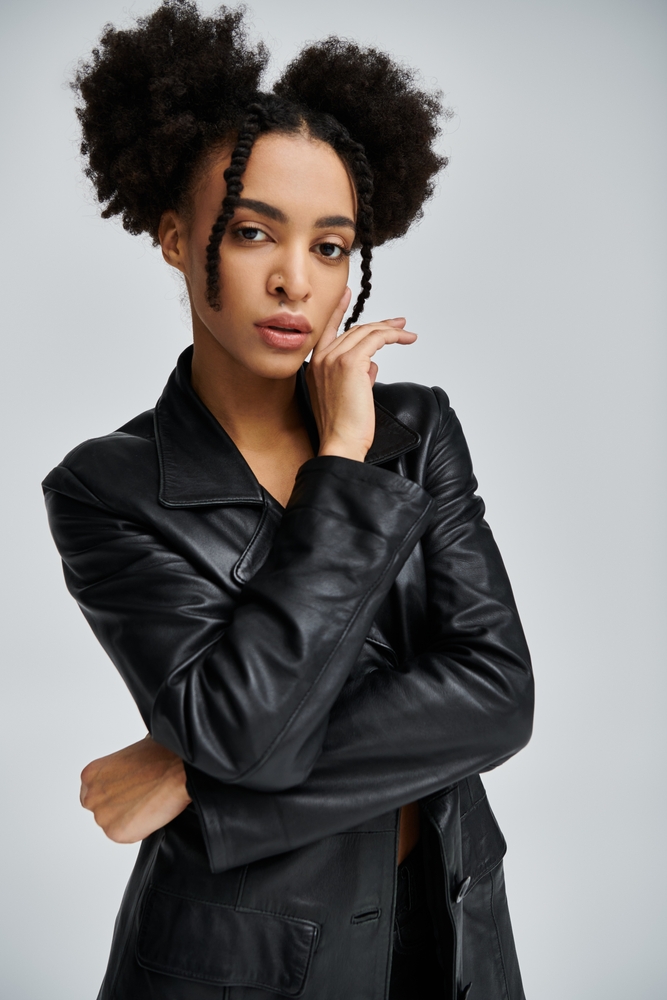 portrait of a woman with afropuffs