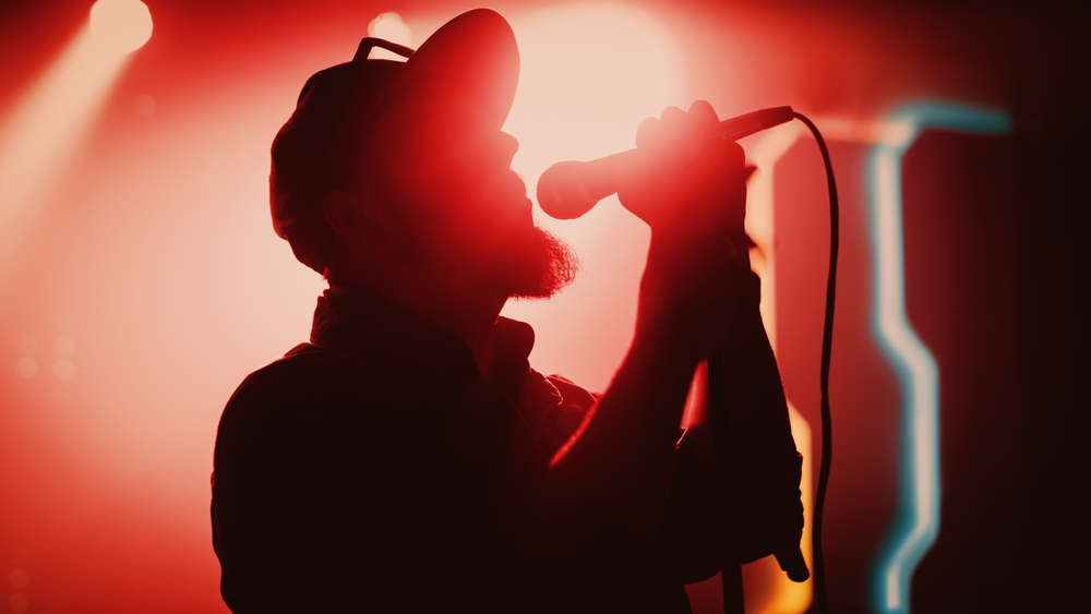 Silhouette of a singer with a microphone